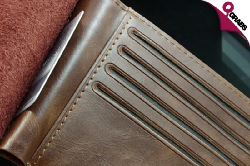 For QR29, Store Your Cards and Cash in a Bailini Bi-fold Men's Wallet! (QR79 Value)